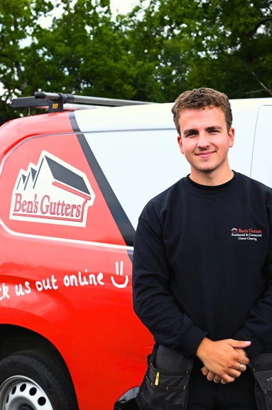 our gutter cleaner in Bedford standing by company vehicle